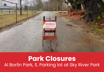Image of a park closed sign at the entrance to the South Parking lot at Sky River Park.