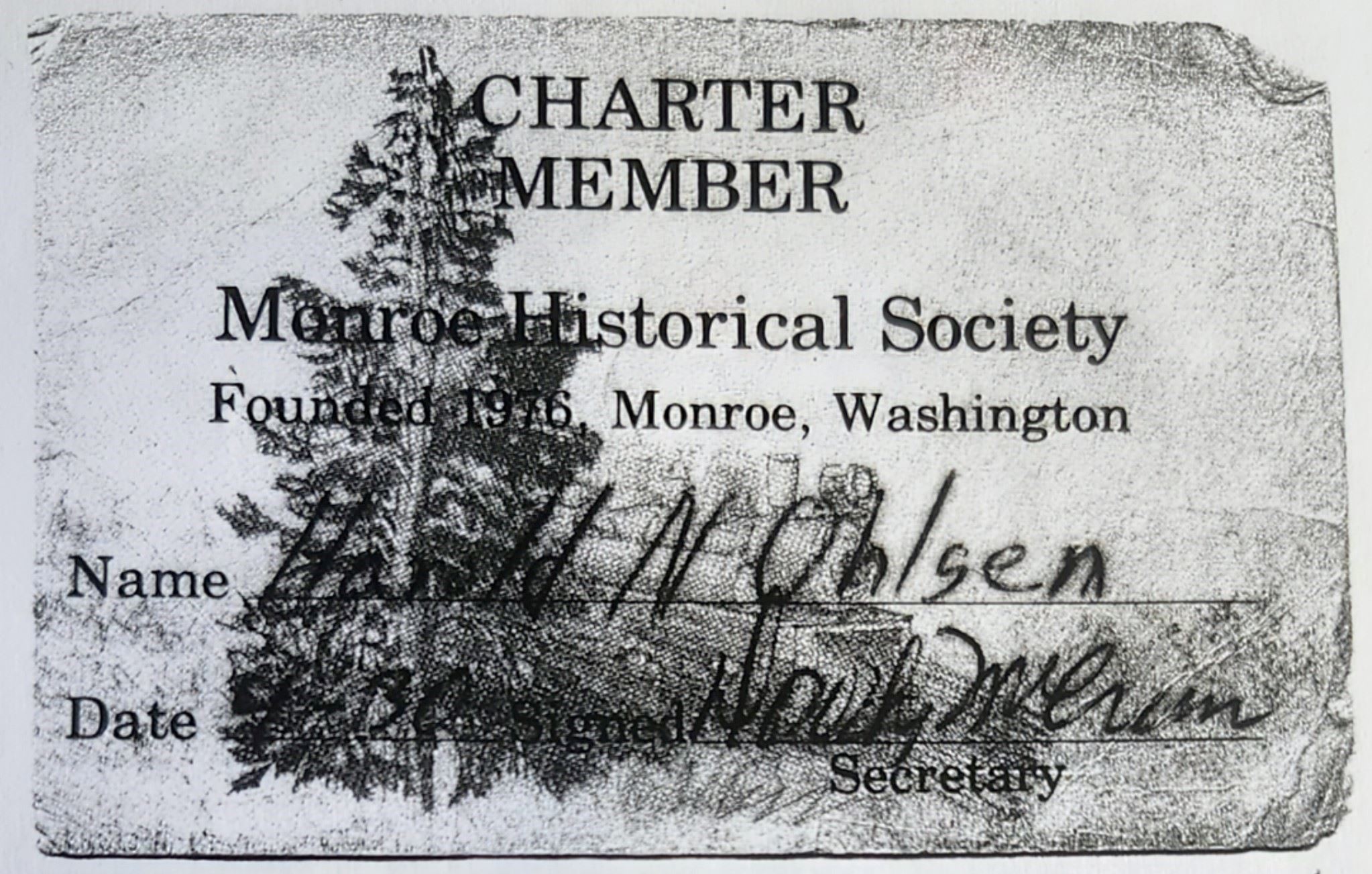 Historic photo of a Chamber Member's card for the Monroe Historical Society.